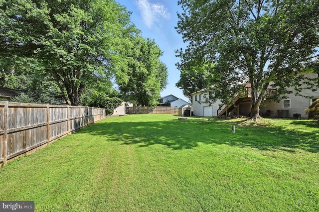 - fenced backyard with a shed and stairway