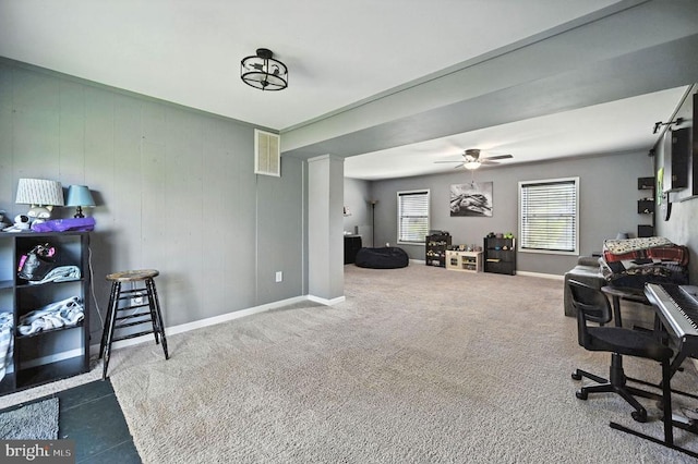  - home office featuring baseboards and a ceiling fan