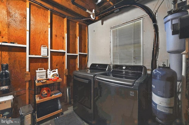  - laundry area with washing machine and clothes dryer