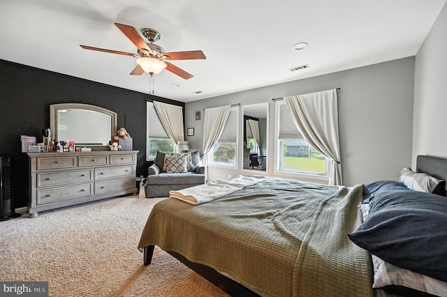  - bedroom featuring carpet flooring and ceiling fan