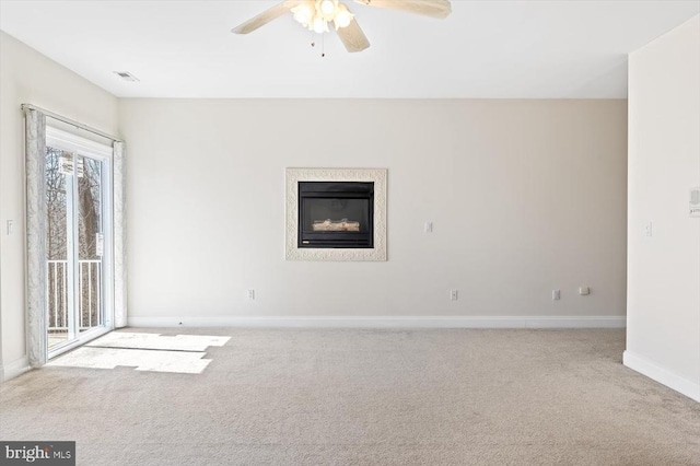 3714 Fairways Ct, Fredericksburg, VA 22408 - carpeted empty room with a ceiling fan, baseboards, and a glass covered fireplace