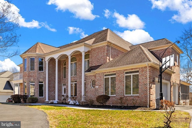 3714 Fairways Ct, Fredericksburg, VA 22408 - view of front of property with concrete driveway, brick siding, roof with shingles, a front lawn, and a garage