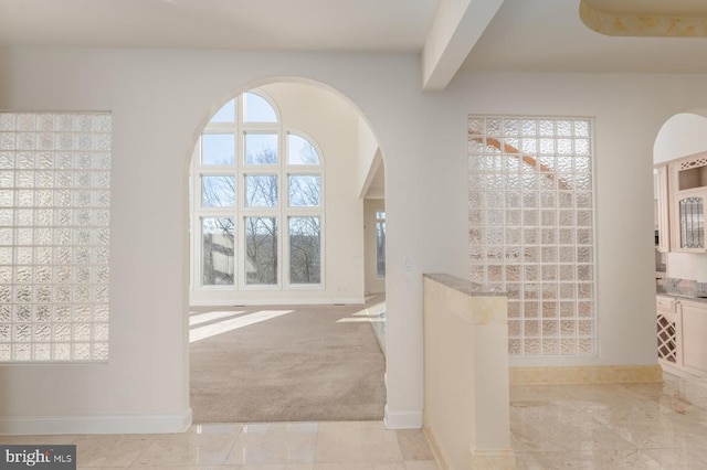 3714 Fairways Ct, Fredericksburg, VA 22408 - foyer entrance with arched walkways, carpet, baseboards, and beam ceiling