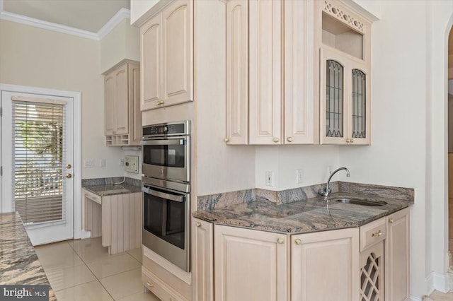 3714 Fairways Ct, Fredericksburg, VA 22408 - kitchen featuring a sink, double oven, dark stone counters, crown molding, and glass insert cabinets