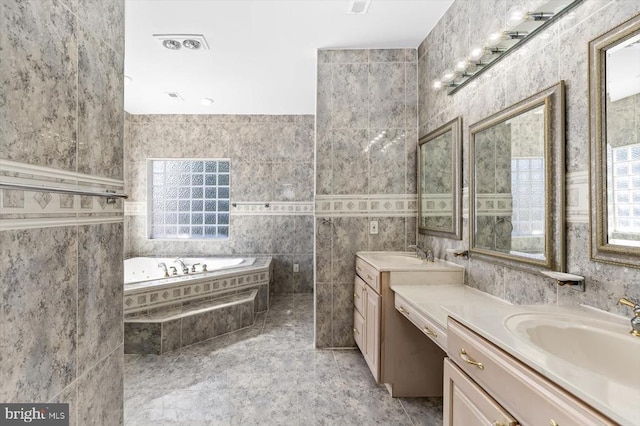 3714 Fairways Ct, Fredericksburg, VA 22408 - full bathroom with tile walls, two vanities, and a garden tub