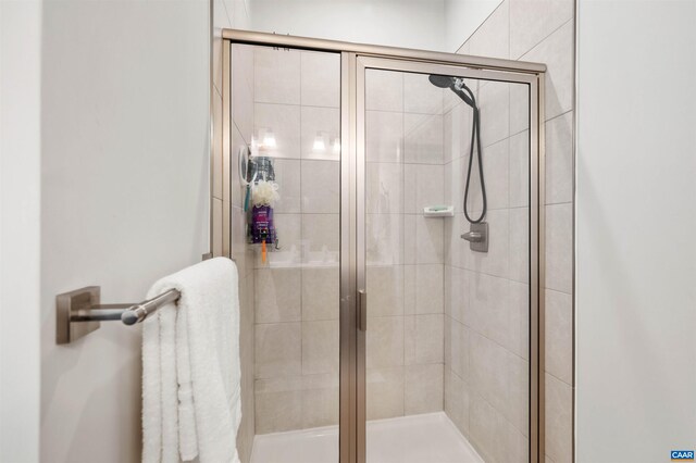 full bathroom with a shower stall