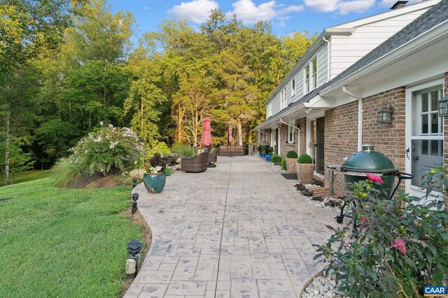 6904 James Madison Hwy, Fork Union, VA 23055 - exterior space with a yard and a patio
