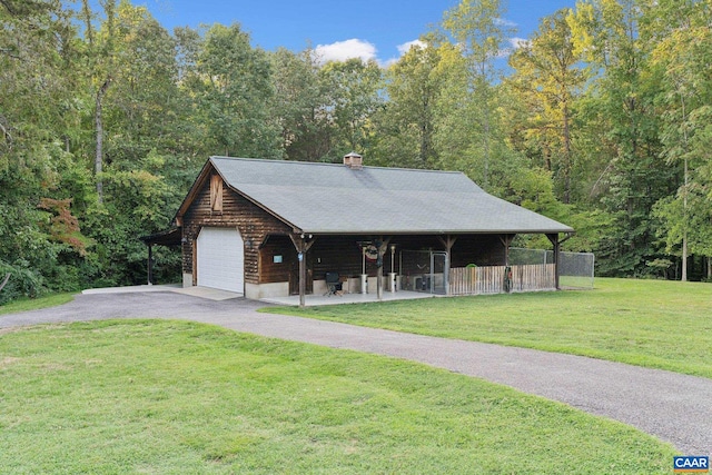 6904 James Madison Hwy, Fork Union, VA 23055 - view of front facade featuring log siding, fence, driveway, a front yard, and a chimney