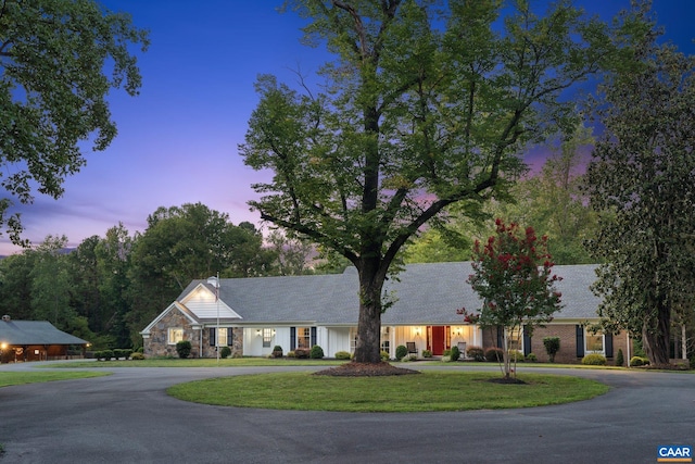 6904 James Madison Hwy, Fork Union, VA 23055 - ranch-style house featuring a front lawn and curved driveway