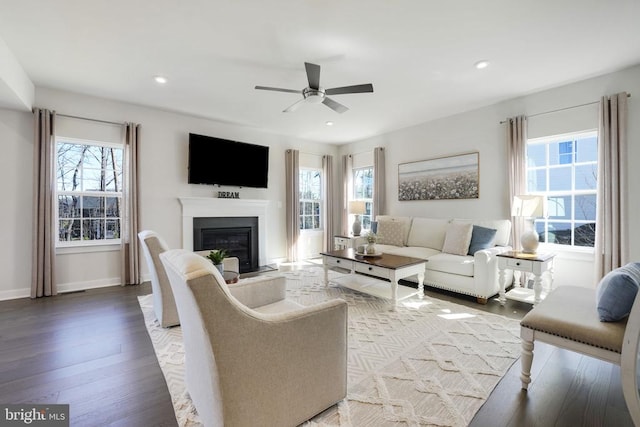 10909 Green Leaf Run, Spotsylvania, VA 22551 - living room with light wood-type flooring, ceiling fan, a fireplace with flush hearth, and recessed lighting
