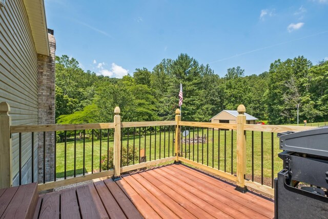 554 Harris Cove Ln, Elkton, VA 22827 - wooden terrace with a lawn, grilling area, and a view of trees