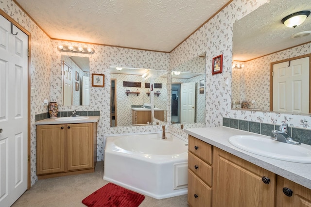 554 Harris Cove Ln, Elkton, VA 22827 - bathroom with a textured ceiling, two vanities, wallpapered walls, a bath, and ornamental molding