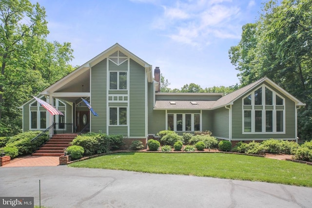 14 Olde Plantation Dr, Fredericksburg, VA 22407 - view of front of home featuring a chimney and a front yard