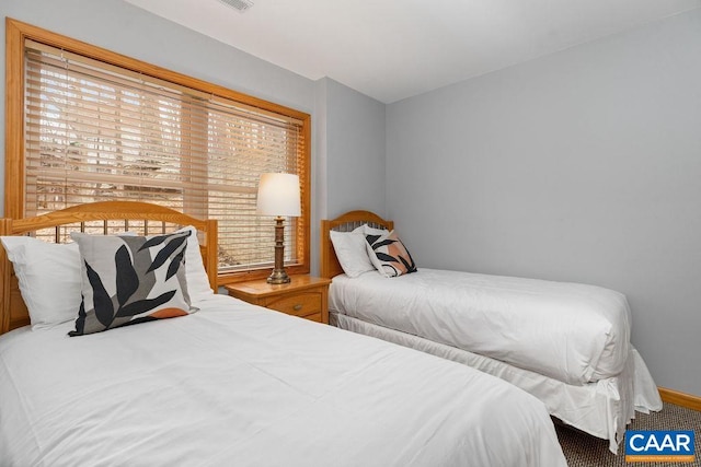 bedroom with visible vents