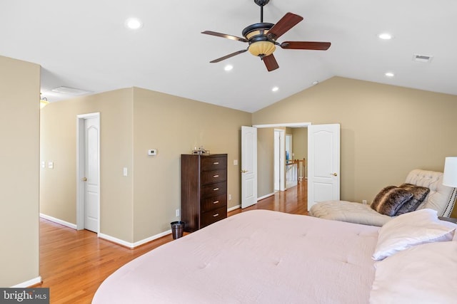 bedroom featuring wood finished floors, baseboards, vaulted ceiling, recessed lighting, and a ceiling fan