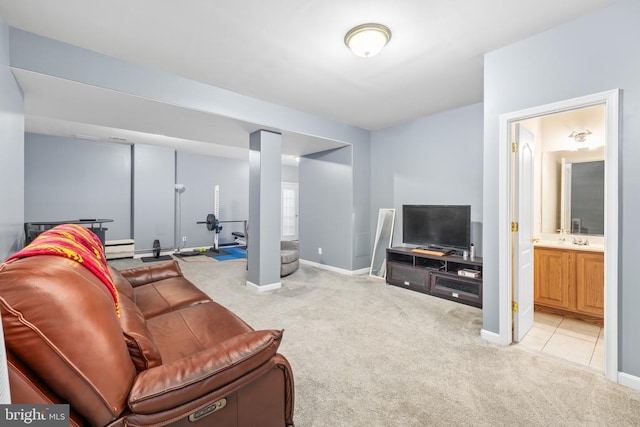 living room with light colored carpet and baseboards