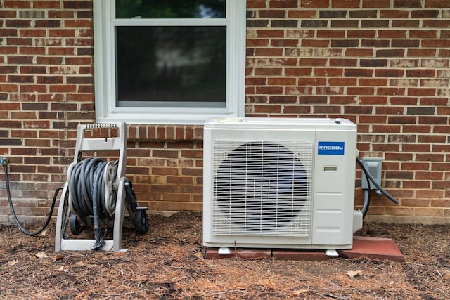 91 Cooper Dr, Stuarts Draft, VA 24477 - exterior view of ac unit and brick siding