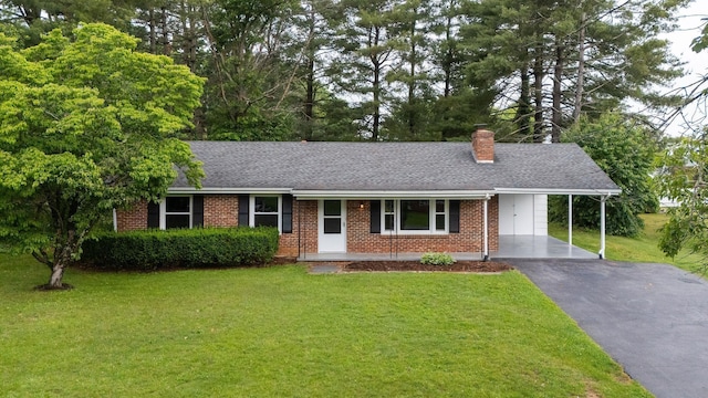 91 Cooper Dr, Stuarts Draft, VA 24477 - ranch-style house with driveway, a front yard, brick siding, and a carport