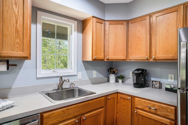 392 Passage Ln, Mcgaheysville, VA 22840 - kitchen with a sink, appliances with stainless steel finishes, light countertops, and brown cabinetry