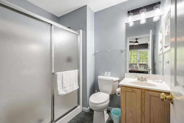 392 Passage Ln, Mcgaheysville, VA 22840 - bathroom featuring ceiling fan, a shower stall, toilet, and vanity