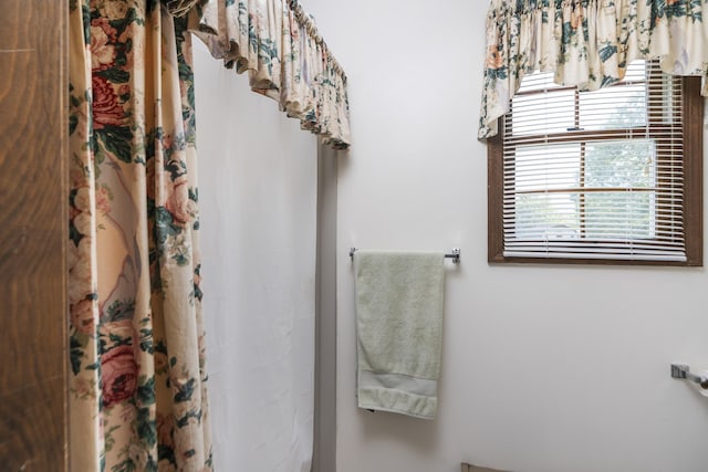 bathroom with curtained shower