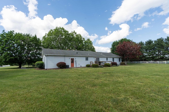 back of property with a deck