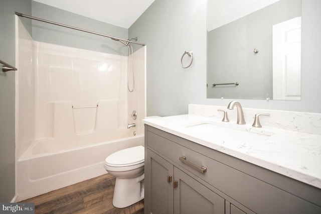 614 Yorktown Blvd, Locust Grove, VA 22508 - bathroom featuring vanity, toilet, wood finished floors, and shower / tub combination