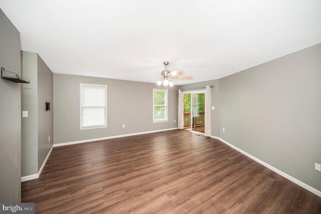 614 Yorktown Blvd, Locust Grove, VA 22508 - spare room featuring ceiling fan, baseboards, and dark wood-style flooring