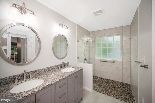 614 Yorktown Blvd, Locust Grove, VA 22508 - bathroom with a walk in shower and double vanity