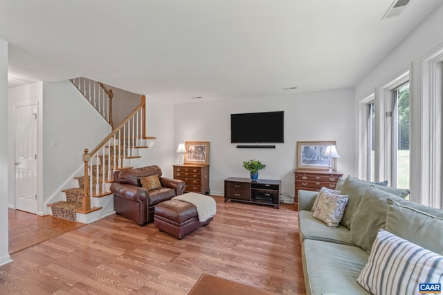 4870 Mechums River Rd, Charlottesville, VA 22901 - living room with stairs and light wood finished floors