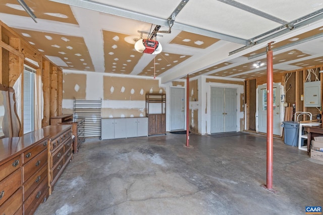 4870 Mechums River Rd, Charlottesville, VA 22901 - garage featuring a garage door opener and electric panel