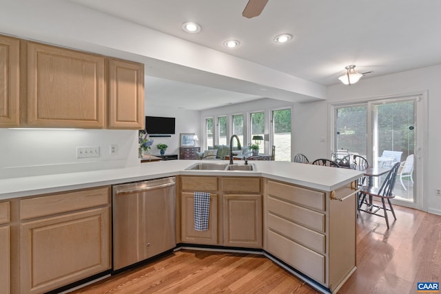 4870 Mechums River Rd, Charlottesville, VA 22901 - kitchen featuring stainless steel dishwasher, light brown cabinetry, a peninsula, light countertops, and light wood-style floors