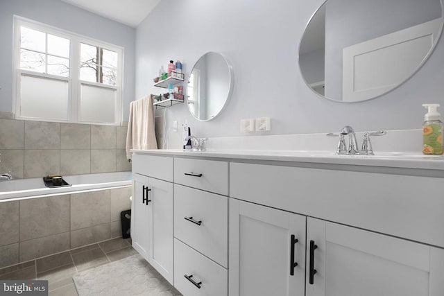 5223 Wyndemere Cir, Mineral, VA 23117 - bathroom with a sink, double vanity, a bath, and tile patterned flooring