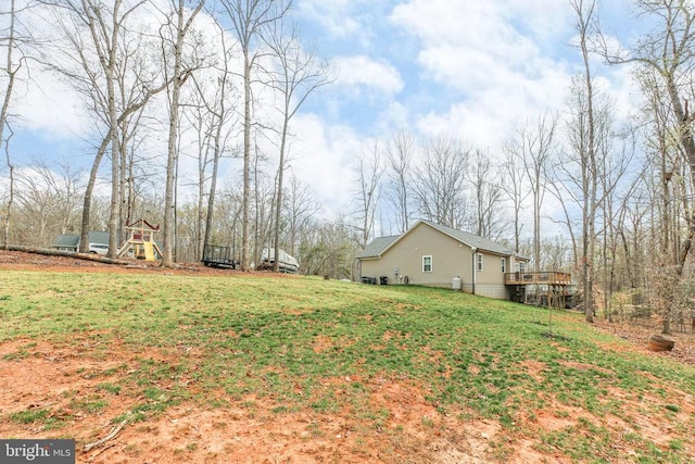 5223 Wyndemere Cir, Mineral, VA 23117 - view of yard with a wooden deck and a playground