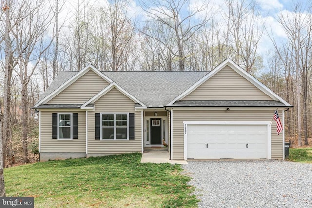 5223 Wyndemere Cir, Mineral, VA 23117 - single story home featuring a front lawn, roof with shingles, an attached garage, and gravel driveway
