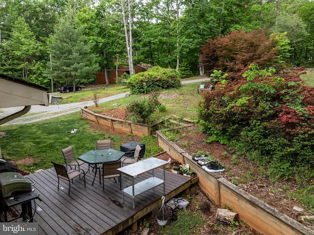 571 Cc Rd, Hood, VA 22723 - deck with outdoor dining space, a garden, and a lawn