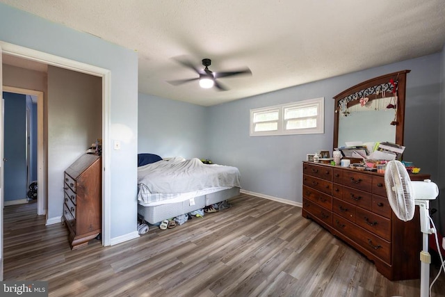 571 Cc Rd, Hood, VA 22723 - bedroom with wood finished floors, baseboards, and ceiling fan