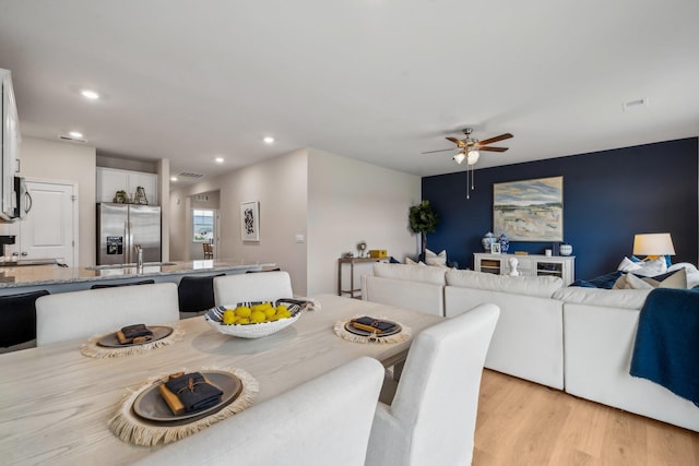 14736 Green View Dr, Elkton, VA 22827 - dining area featuring light wood-style flooring, a ceiling fan, and recessed lighting
