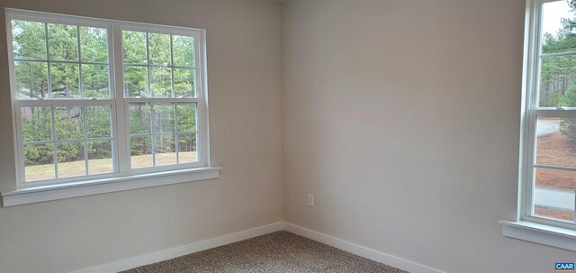 view of carpeted spare room