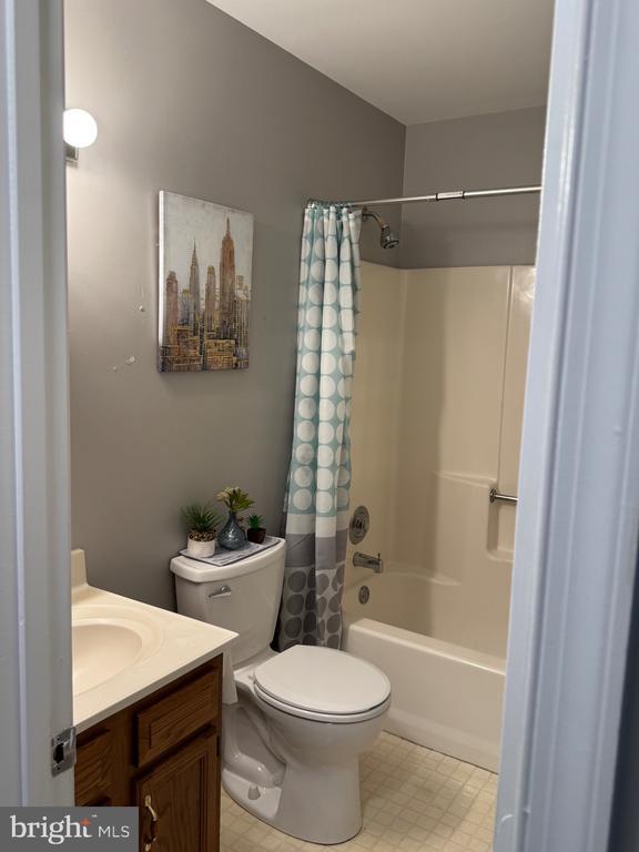 800 Dunlap St, Fredericksburg, VA 22407 - bathroom with vanity, shower / tub combo, and tile patterned floors