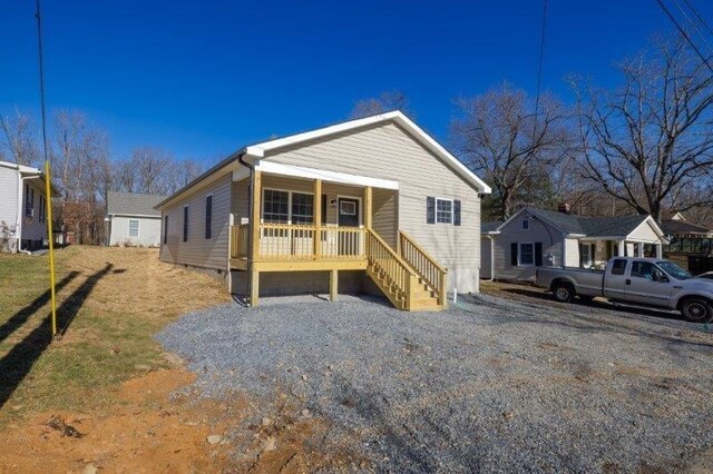 1028 D St, Waynesboro, VA 22980 - view of front facade featuring covered porch and crawl space