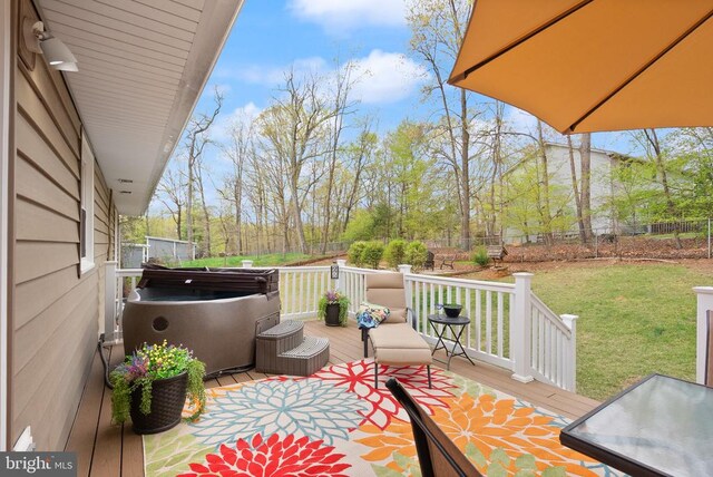  - wooden terrace featuring a hot tub