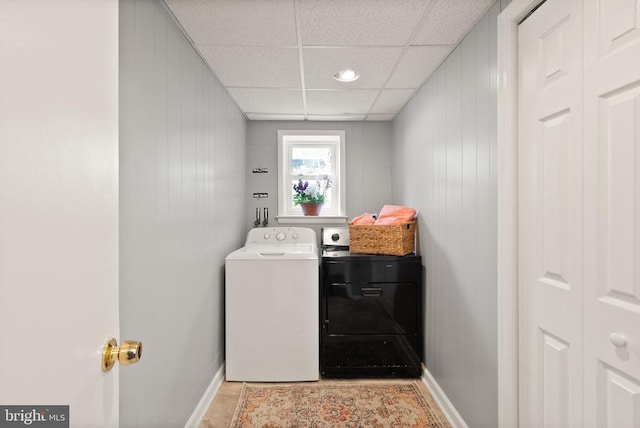  - laundry room with separate washer and dryer, baseboards, recessed lighting, and wooden walls