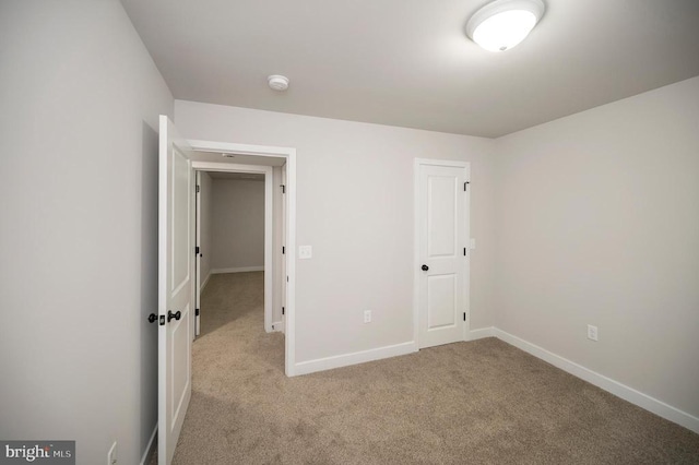3149 Lewiston Rd, Bumpass, VA 23024 - unfurnished bedroom featuring light carpet and baseboards
