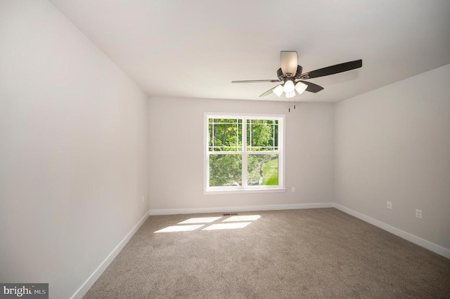 3149 Lewiston Rd, Bumpass, VA 23024 - spare room featuring carpet floors, baseboards, and a ceiling fan