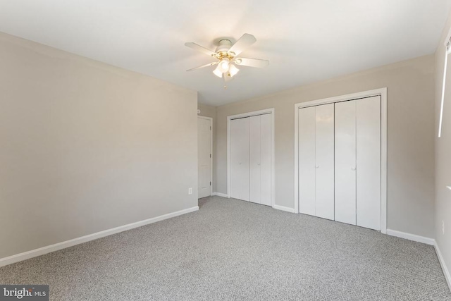 131 Wankoma Dr, Remington, VA 22734 - unfurnished bedroom with multiple closets, carpet floors, and a ceiling fan