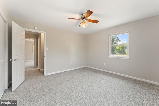 131 Wankoma Dr, Remington, VA 22734 - empty room featuring attic access, light carpet, and ceiling fan