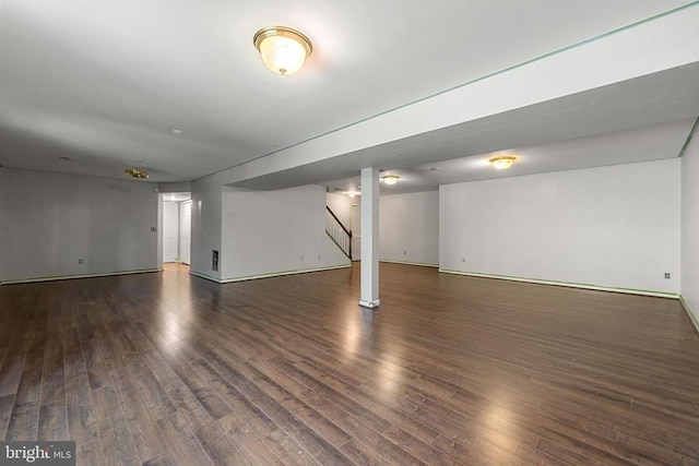  - finished basement with wood finished floors, baseboards, and stairs