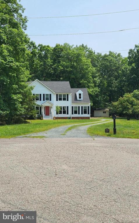 338 Meadow Ridge Rd, Troy, VA 22974 - view of front facade with driveway and a front yard