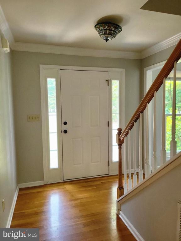 338 Meadow Ridge Rd, Troy, VA 22974 - entrance foyer featuring stairway, wood finished floors, and crown molding